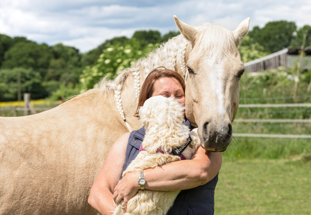 Portrait of a woman with her horse and dog. Pet Photography Essex